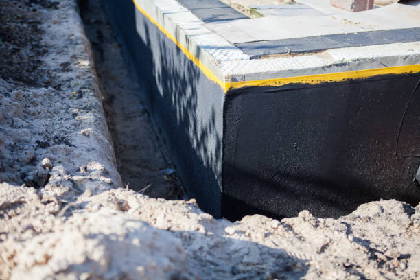 Professional Interior Drainage System technician working in Bloomingdale, NJ